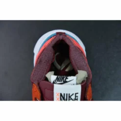 HypeYourBeast Nike Blazer Low Sacai KAWS Red 28 HypeYourBeast Nike Blazer Low Sacai KAWS Red